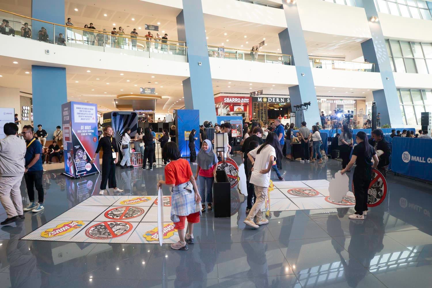 The activitiy area filled with games, photobooths, and information against misinformation.