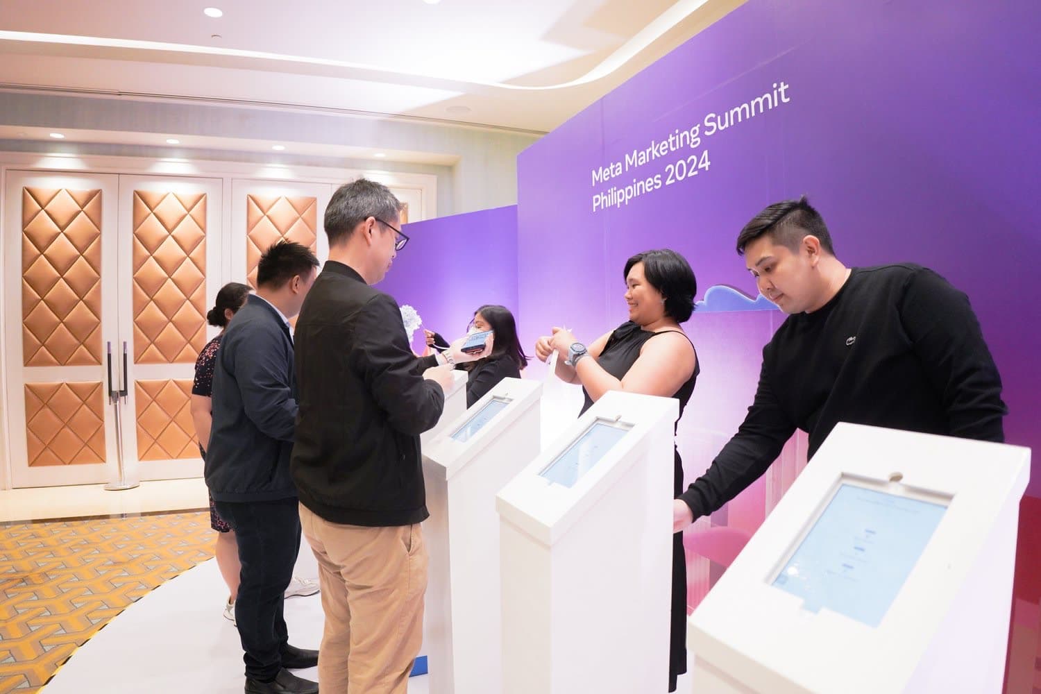 Our experienced team assisting with the Splashthat self-checkin kiosks.